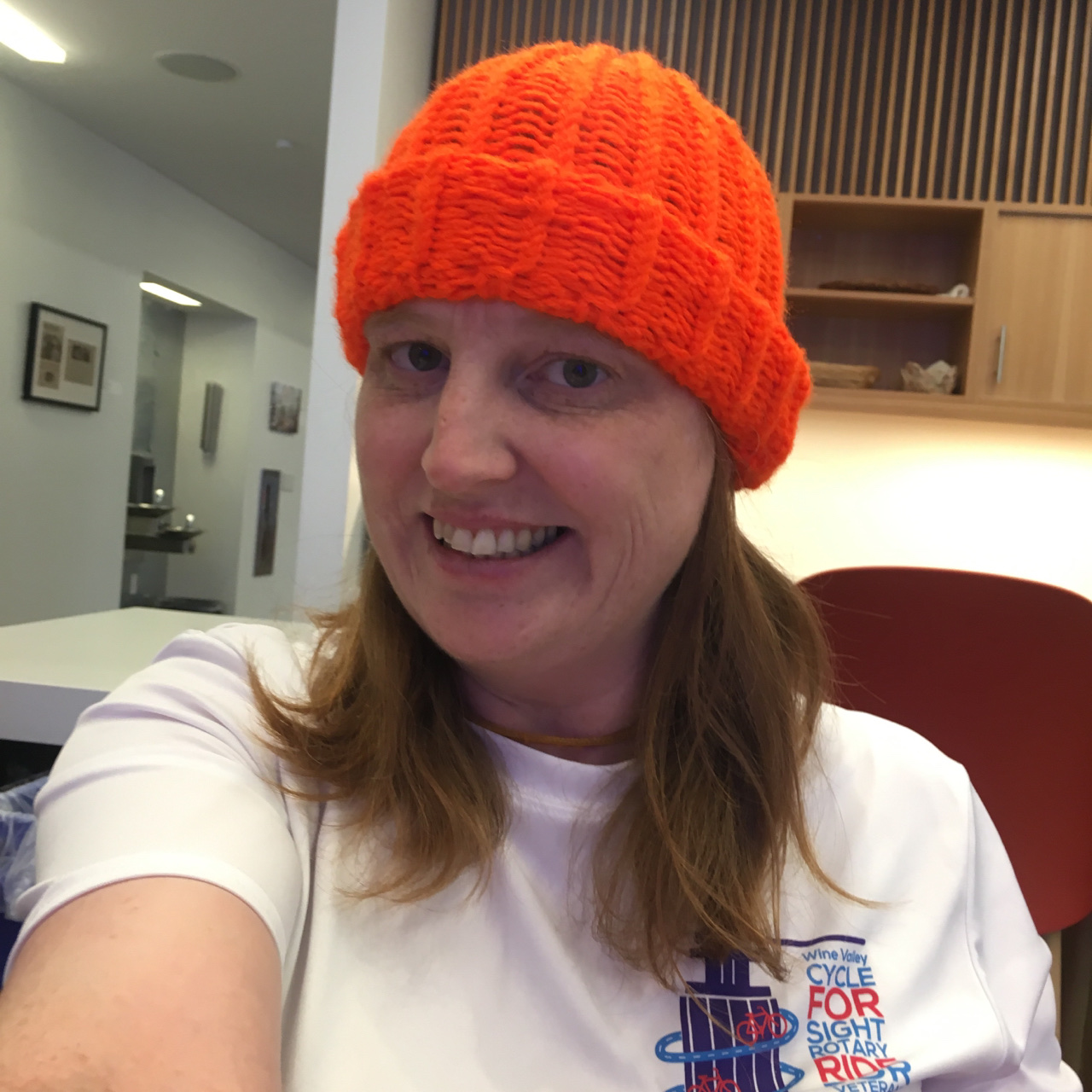 Serena smiles for a selfie sporting her new orange beanie.